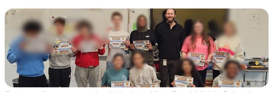 Peer mediators recognized at Herbert Akins Road Middle School, faces blurred for privacy